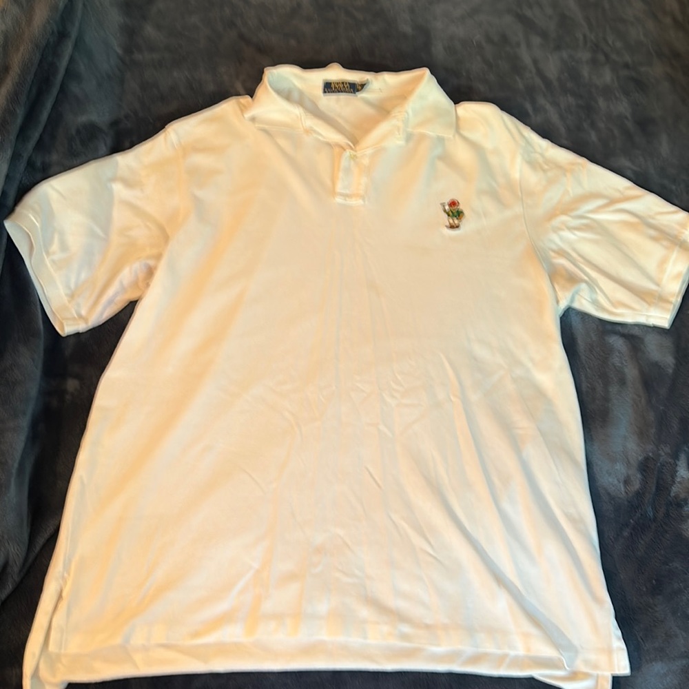 Used whit polo golf shirt sz xl damaged stain.